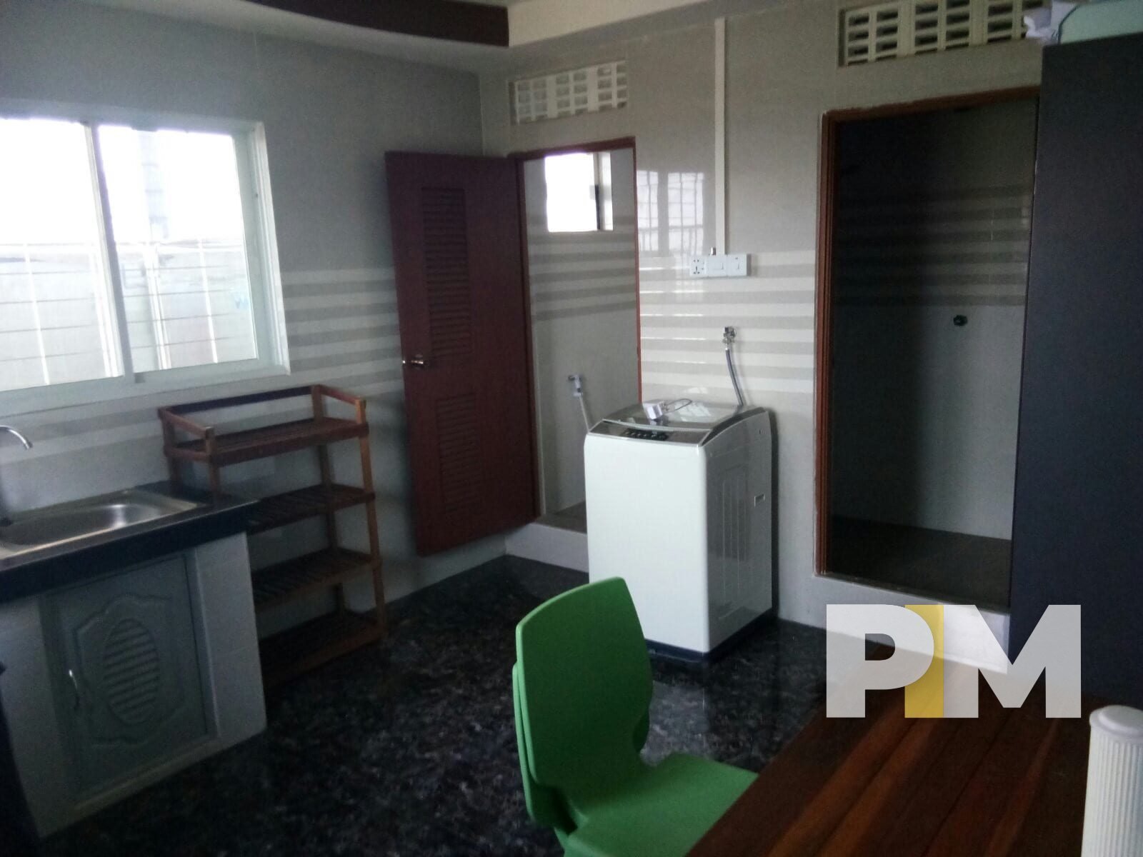 kitchen in penthouse for rent in sanchaung