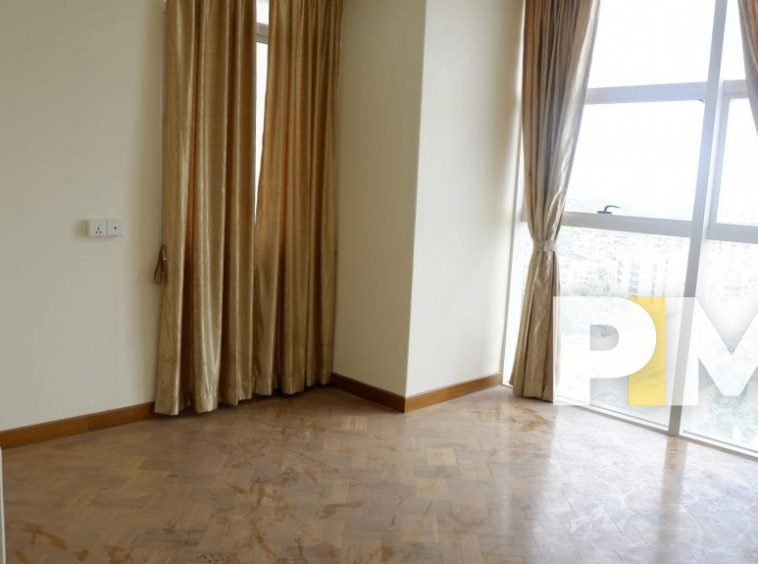 master bedroom in apartment for rent in yangon