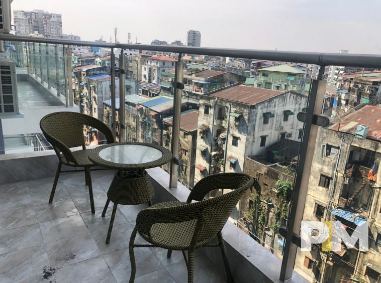 balcony with table and chairs - yangon real estate