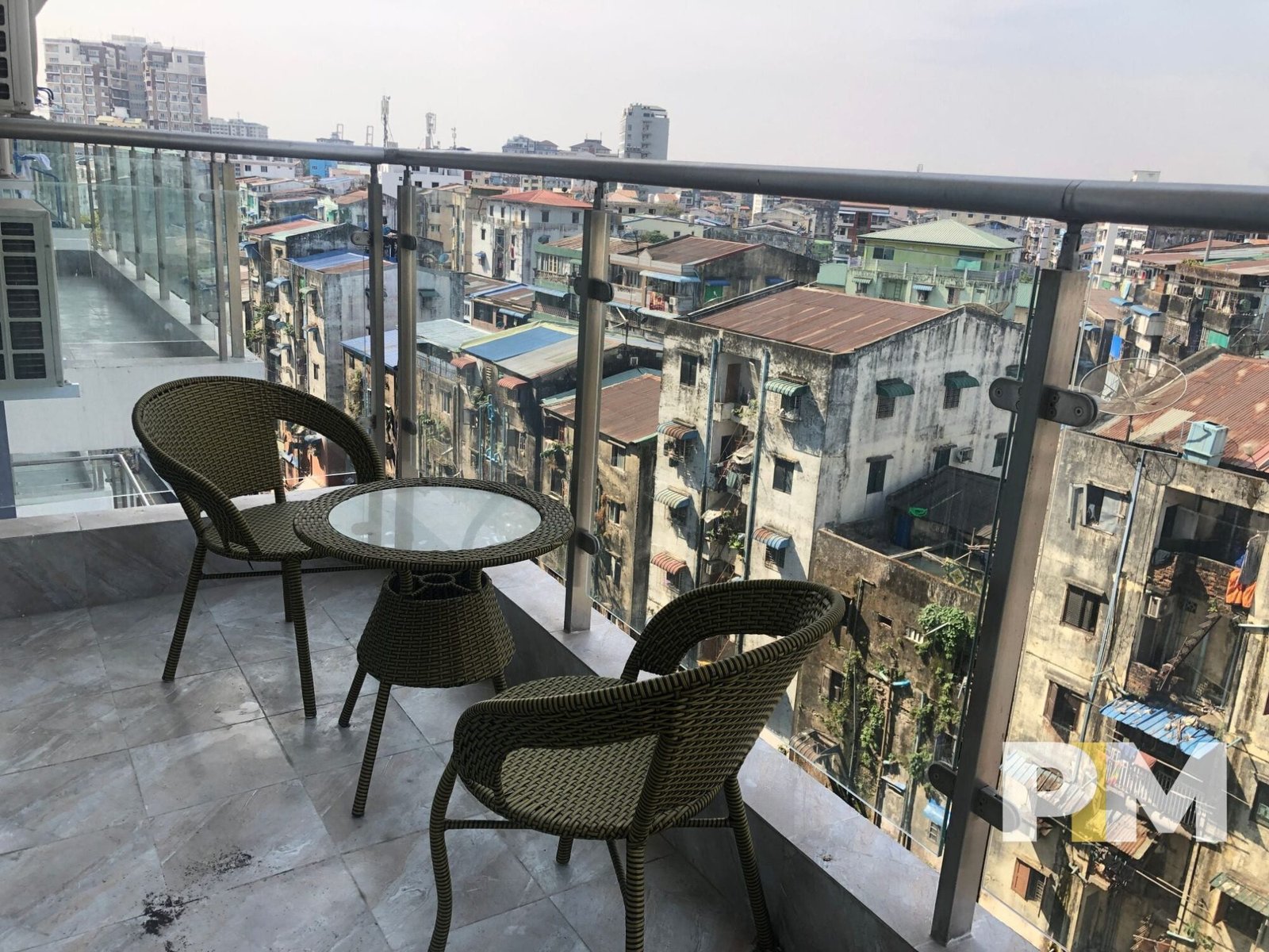 balcony with table and chairs - yangon real estate