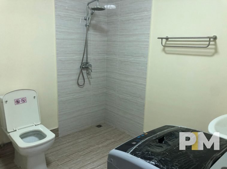 bathroom with washing machine and shower - real estate in yangon