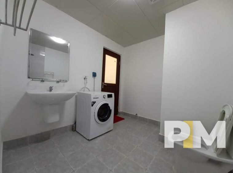 bathroom with washing machine - sanchaung garden condo for rent