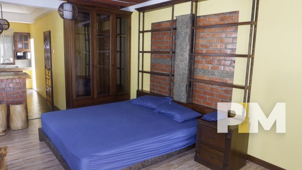 bed and side table - property in myanmar