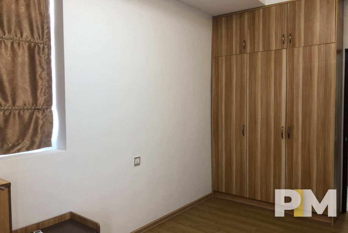 bedroom with full length wardrobes - real estate in yangon