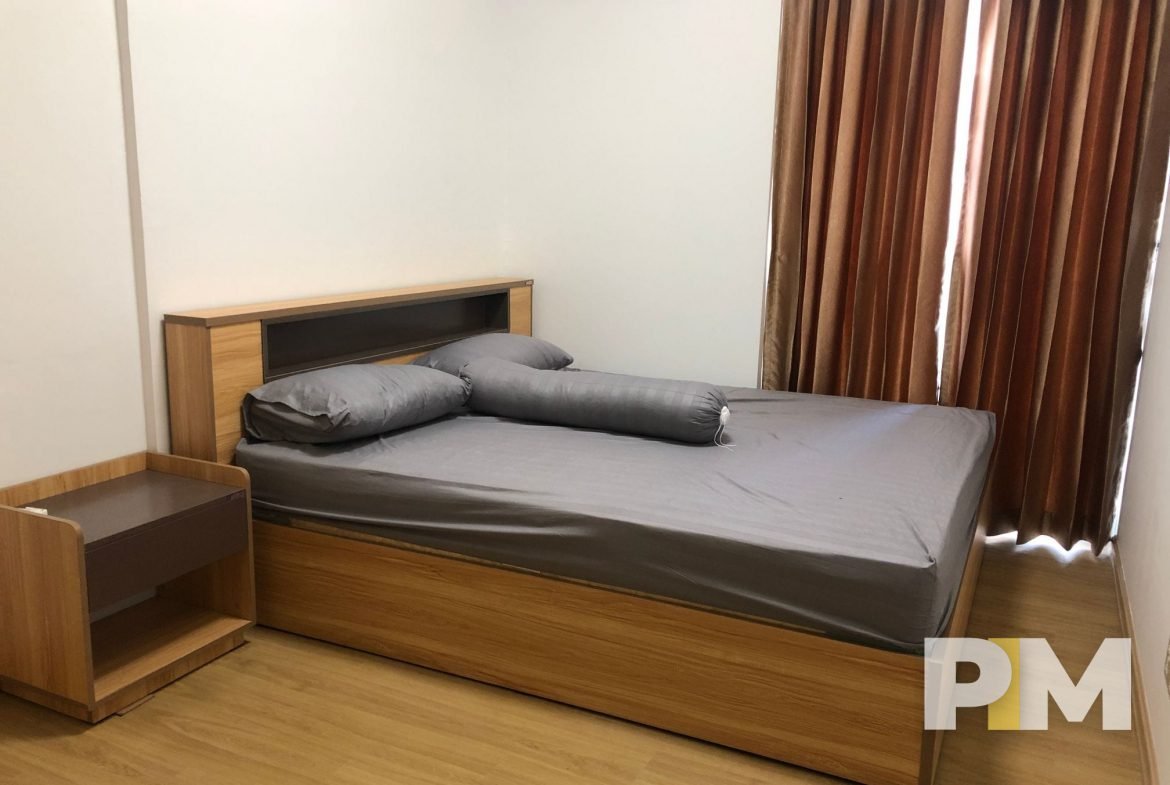 bedroom with side table - real estate in sanchaung