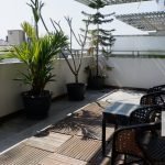 large terrace with chairs and plants - myanmar real estate