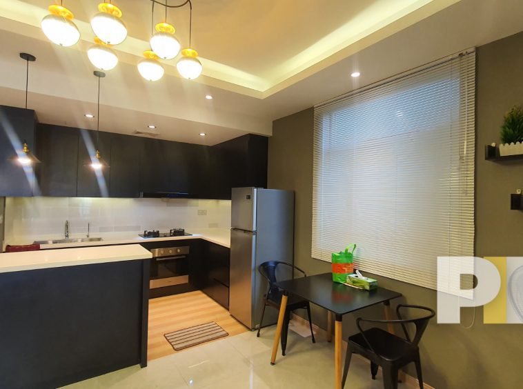 stylish kitchen in apartment for rent in sanchaung garden