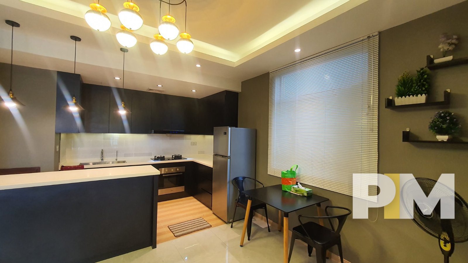 stylish kitchen in apartment for rent in sanchaung garden