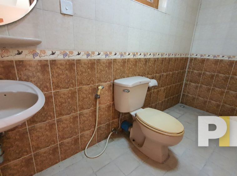 toilet in building for rent in yangon