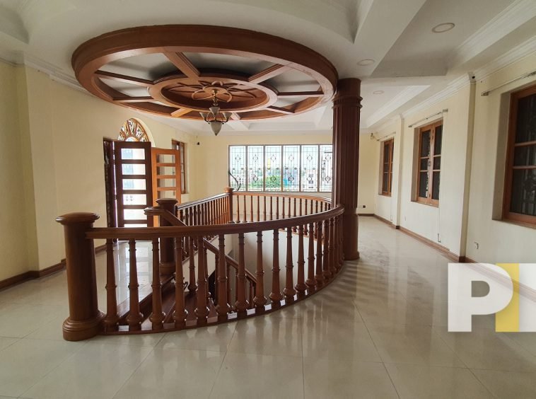 top floor with spiral stair case in building for rent in yangon