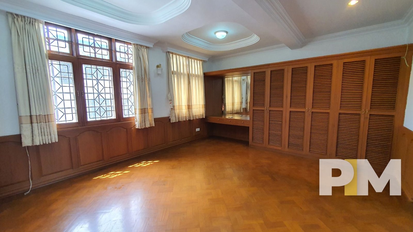 large room with full length wardrobe - yangon real estate