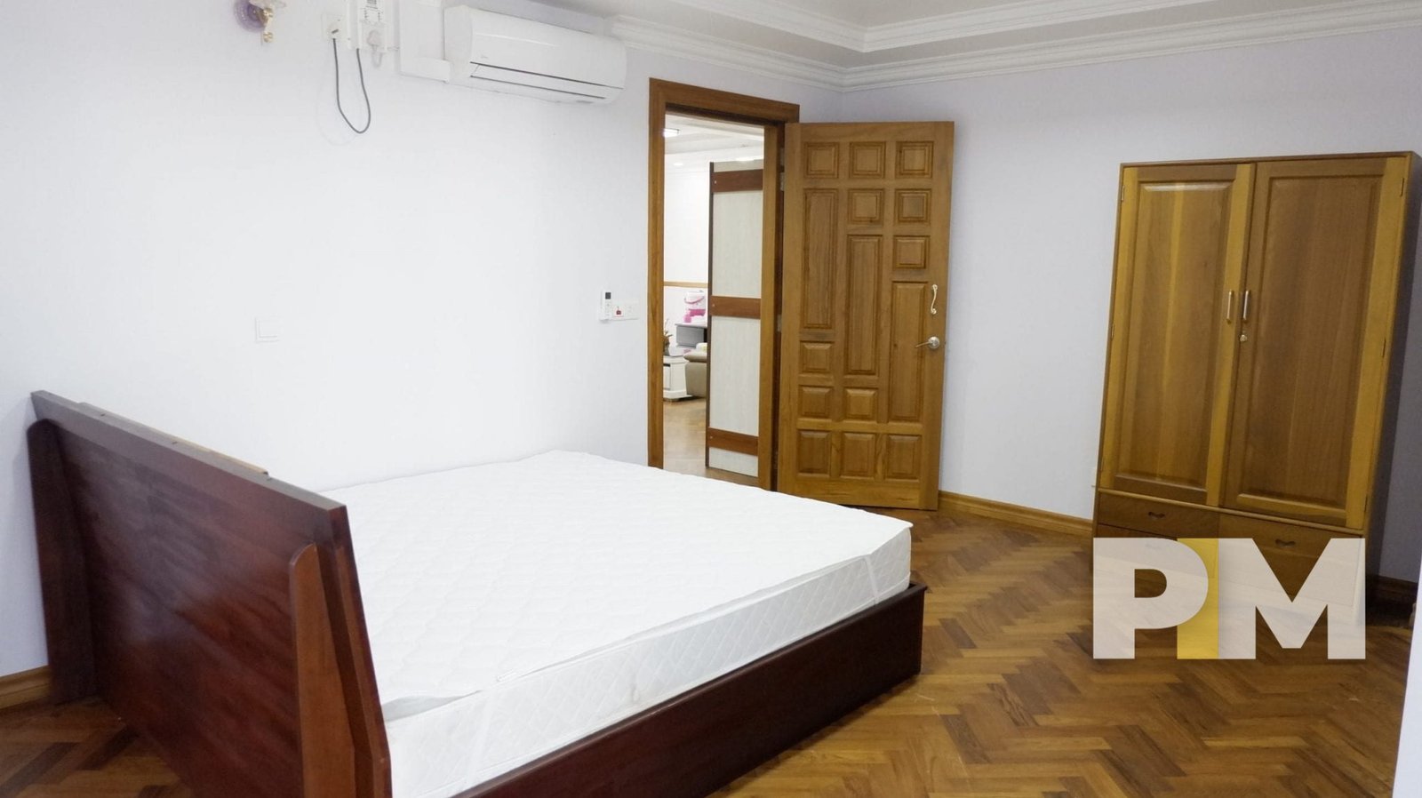 wooden bed frame and mattress - yangon real estate