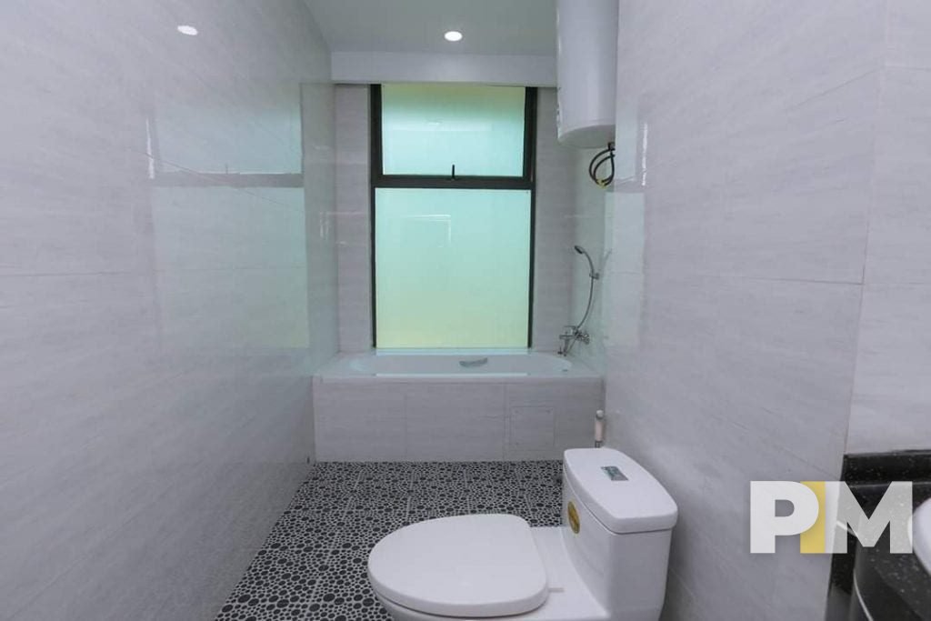 bathroom with bathtub - property in Yangon