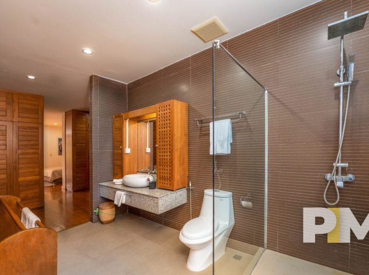 bathroom with shower tub - property in Yangon