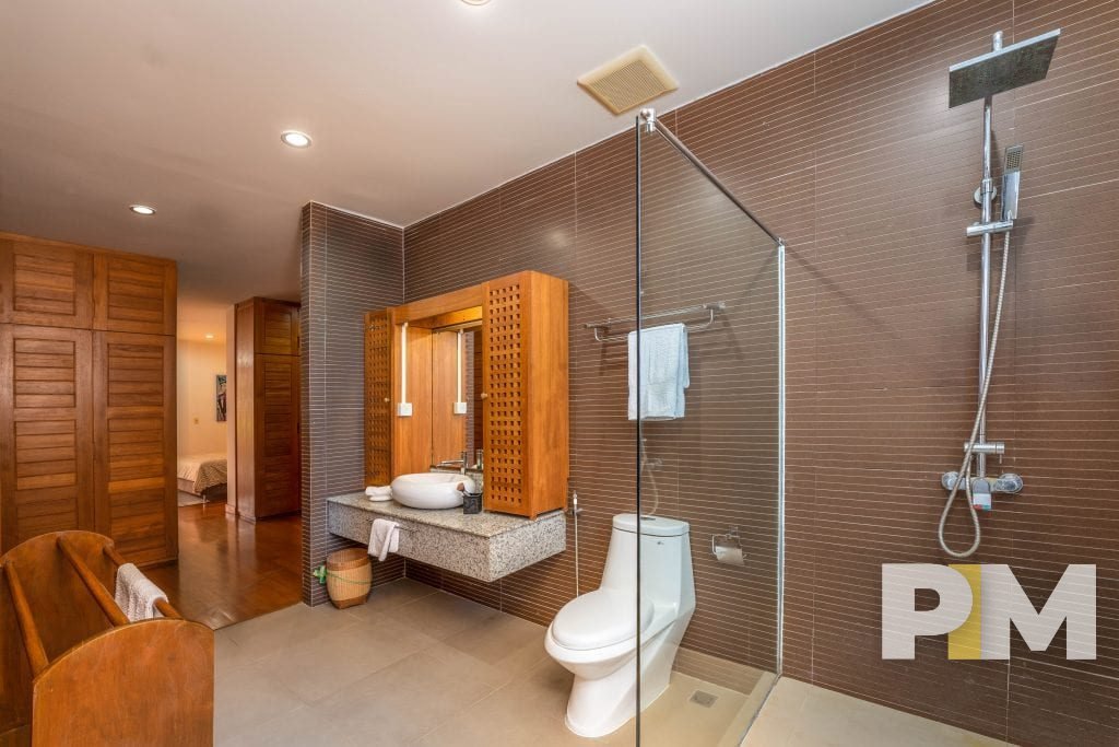 bathroom with shower tub - property in Yangon