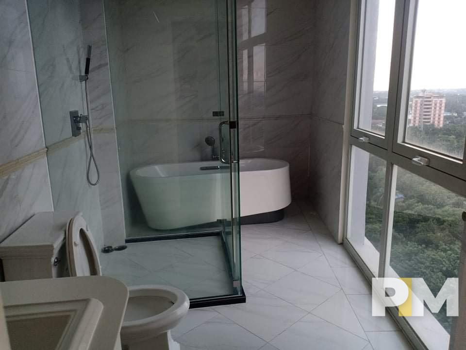 bathroom with tub - property in Yangon