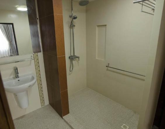 bathroom with tub - property in Yangon