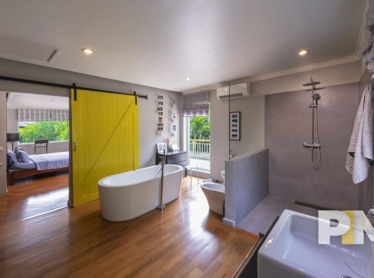 bathroom with tub - property in Yangon