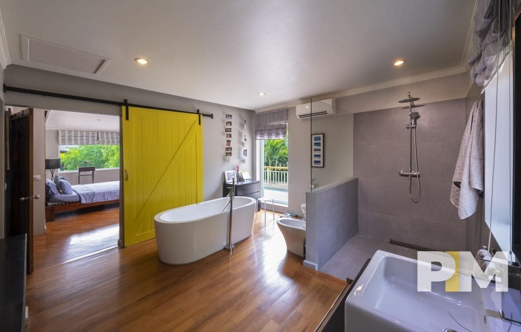 bathroom with tub - property in Yangon