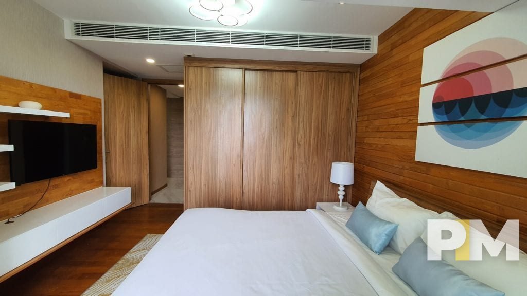 bedroom with TV - Real Estate in Yangon