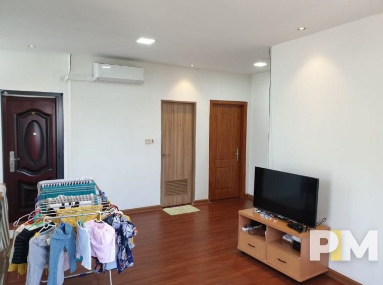 bedroom with TV - Real Estate in Yangon