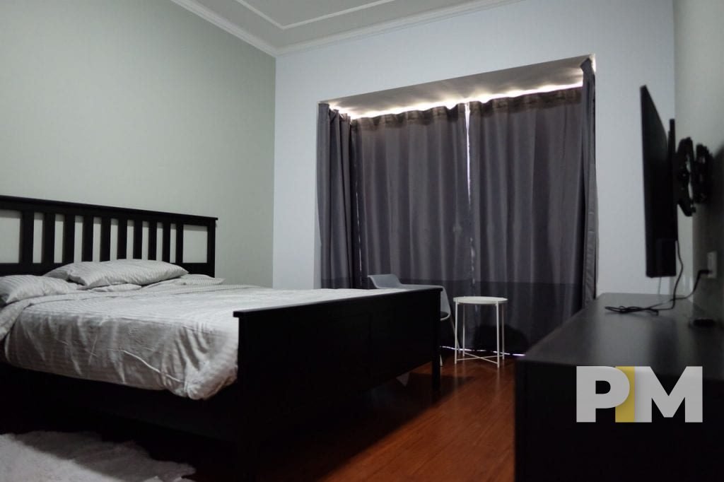 bedroom with TV - Yangon Real Estate