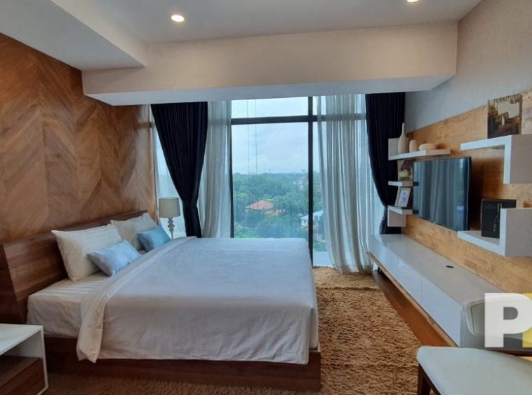 bedroom with TV - properties in Myanmar