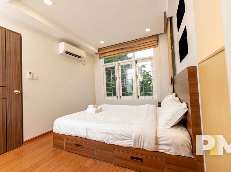 bedroom with bed and mattress - Myanmar Real Estate