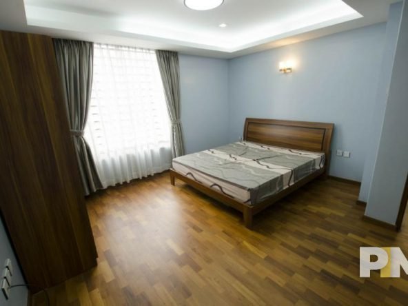 bedroom with bed and mattress - Real Estate in Myanmar
