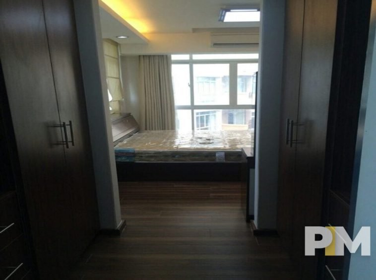 bedroom with bed and mattress - Yangon Real Estate