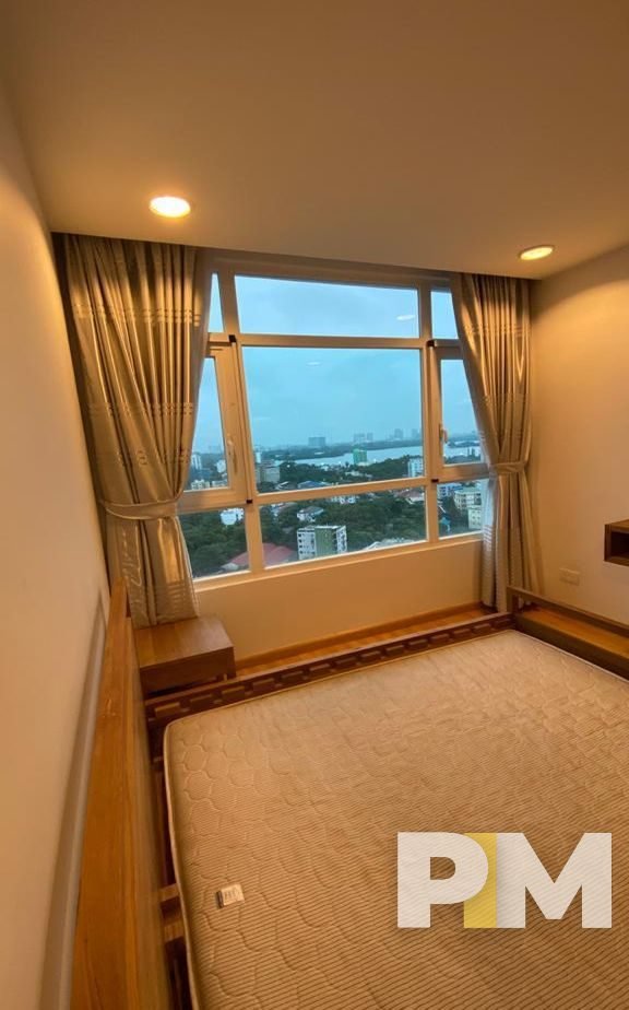 bedroom with bed and mattress - Yangon Real Estate