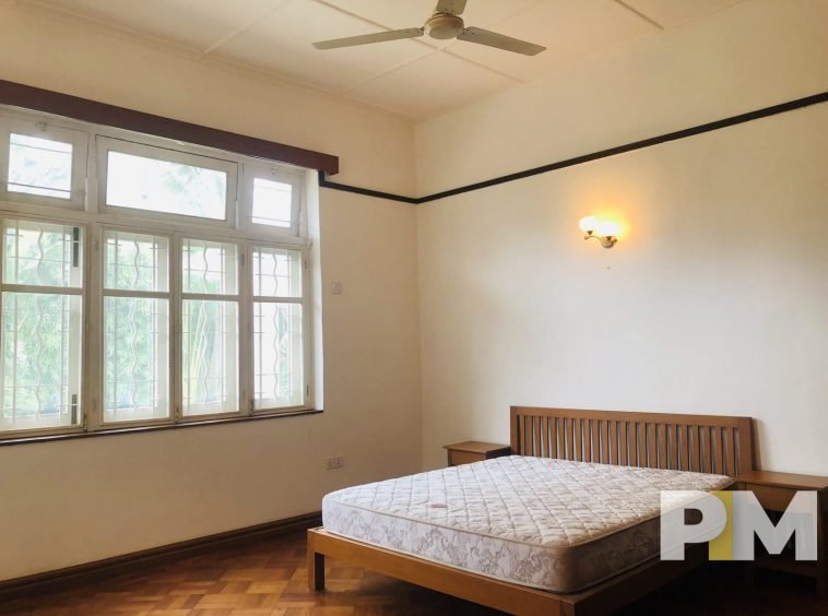 bedroom with bed and mattress - properties in Myanmar