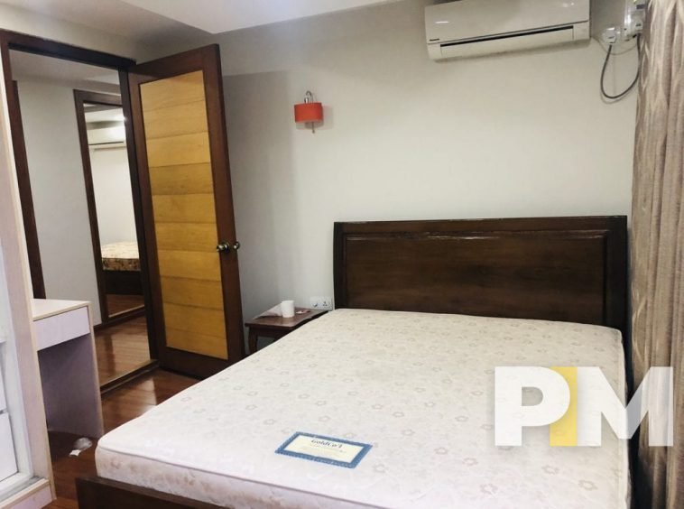 bedroom with bed and mattress - property in Yangon