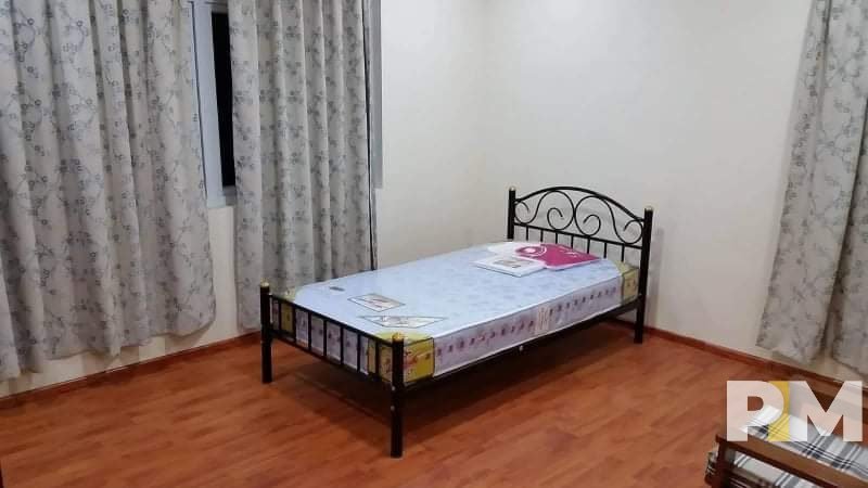 bedroom with bed mattress - Real Estate in Myanmar