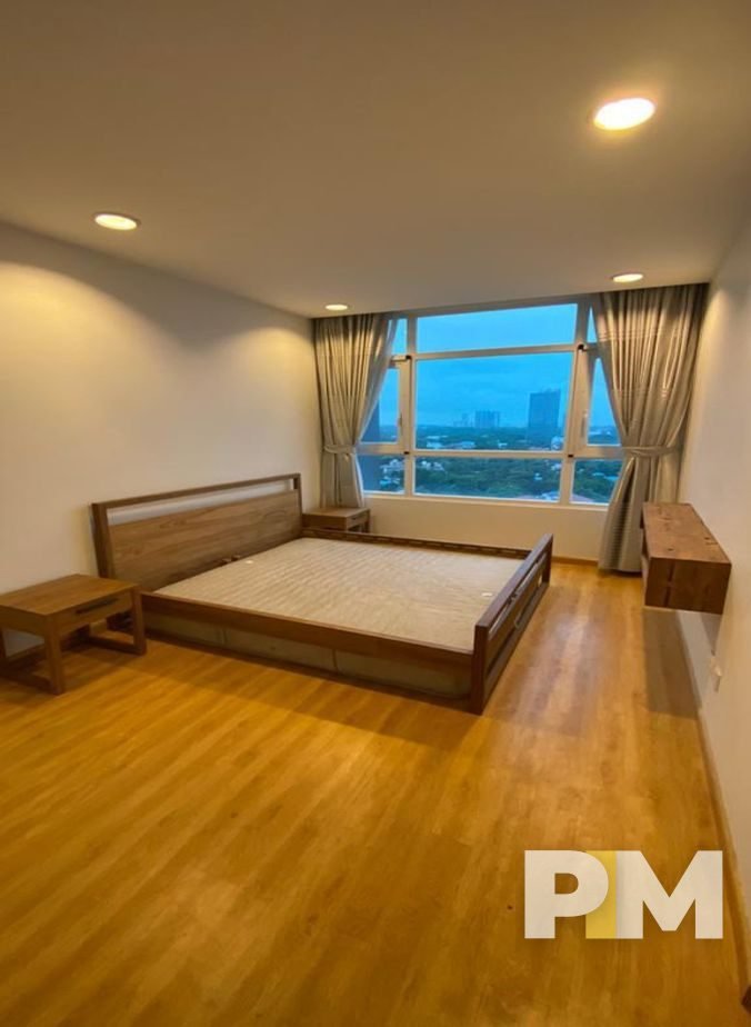 bedroom with bedside desk - Yangon Real Estate