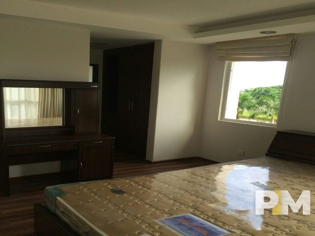bedroom with vanity mirror - properties in Yangon