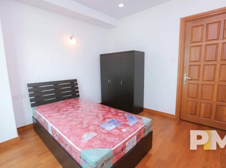 bedroom with wardrobe - Real Estate in Yangon