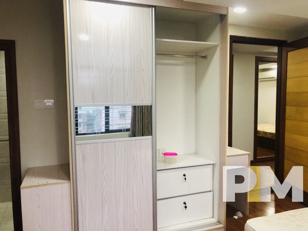 bedroom with wardrobe - properties in Yangon