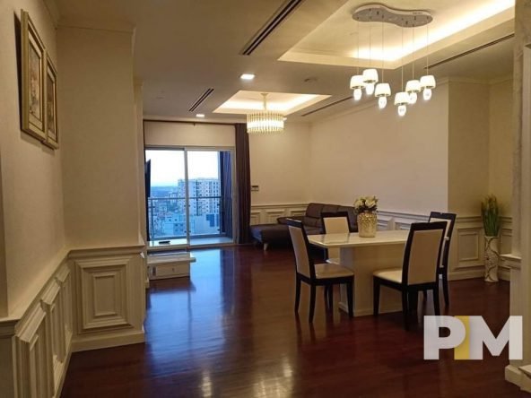 dining room with table and chairs - property in Yangon