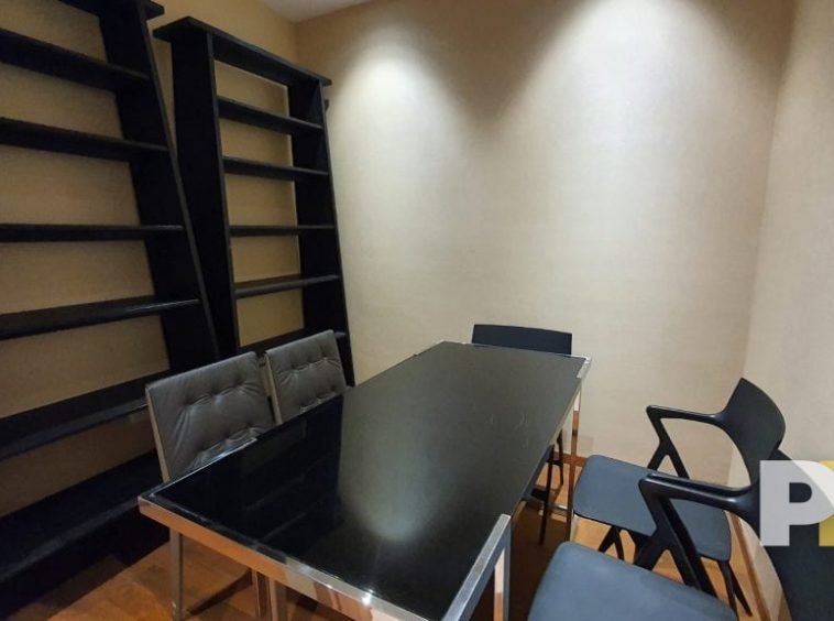 dining room with table and chairs - property in Yangon