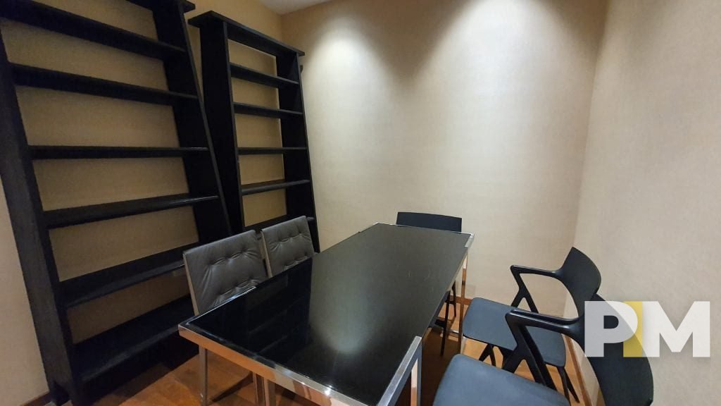 dining room with table and chairs - property in Yangon