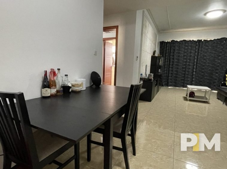 dining room with dining tables - property in Yangon