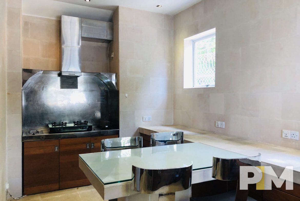 dining room with stove - property in Yangon
