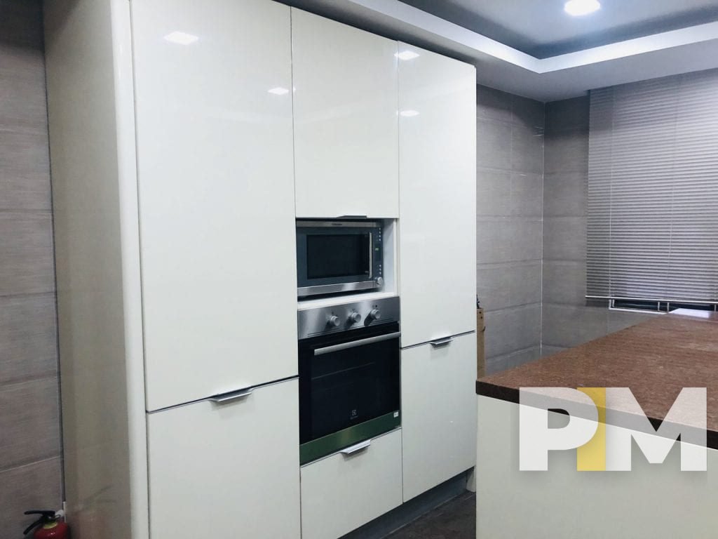 kitchen with cabinets - Myanmar Property