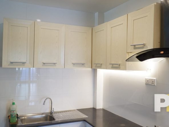 kitchen with cabinets - Real Estate in Myanmar