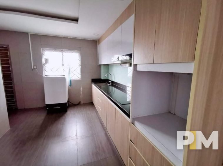 kitchen with cabinets - property in Myanmar