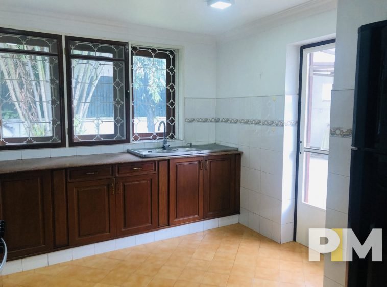kitchen with cabinets - property in Myanmar