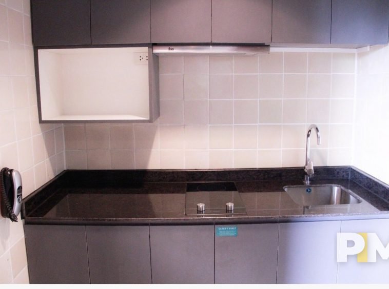 kitchen with cabinets - property in Yangon