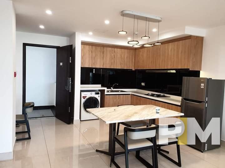 kitchen with dining space - property in Yangon
