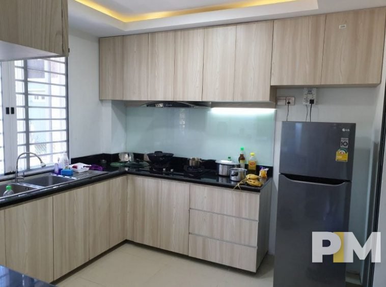 kitchen with fridge - properties in Yangon